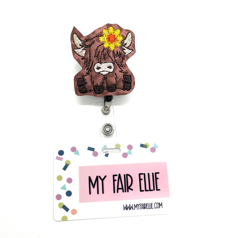 Highland Cow with Yellow Flower // Badge Buddy