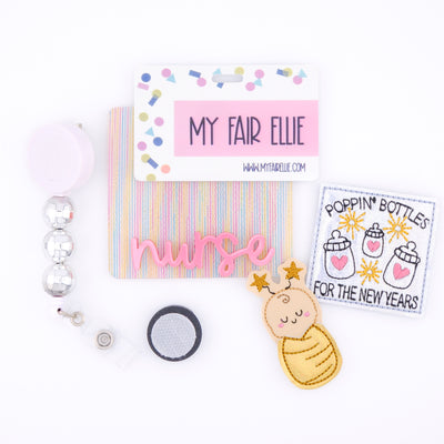 Poppin' Bottles for the New Years // Swaddle Baby // Badge Buddy