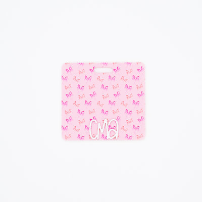 Pink Bows with White Charm Text // Badge Backer // 2-4 Week Turnaround Time