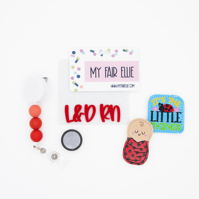 It's the Little Things // Lady Bug Swaddle Baby // Badge Buddy