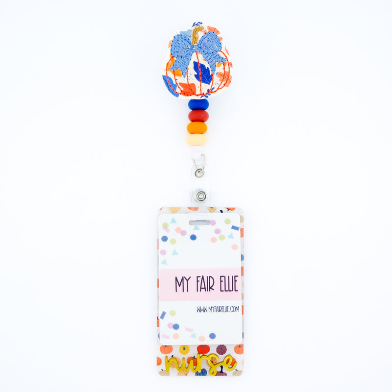 Bright Leaf Print Pumpkin with Blue Bow // Fall
