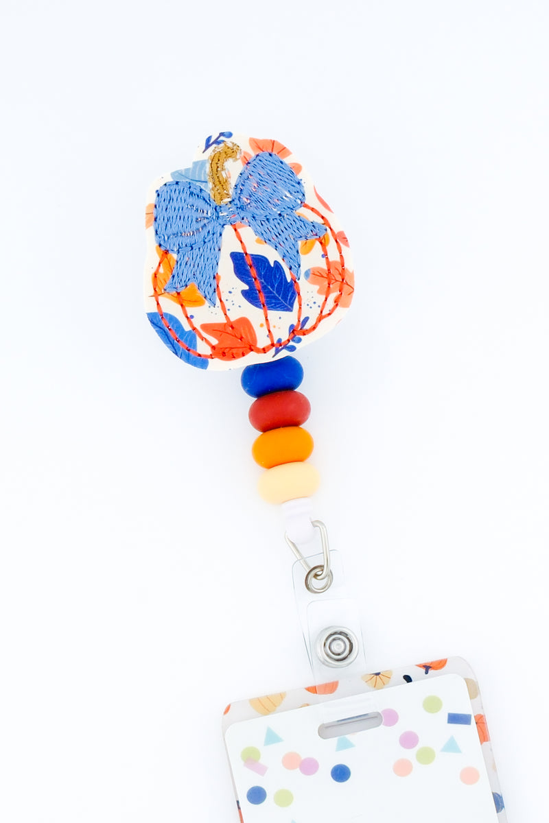 Bright Leaf Print Pumpkin with Blue Bow // Fall
