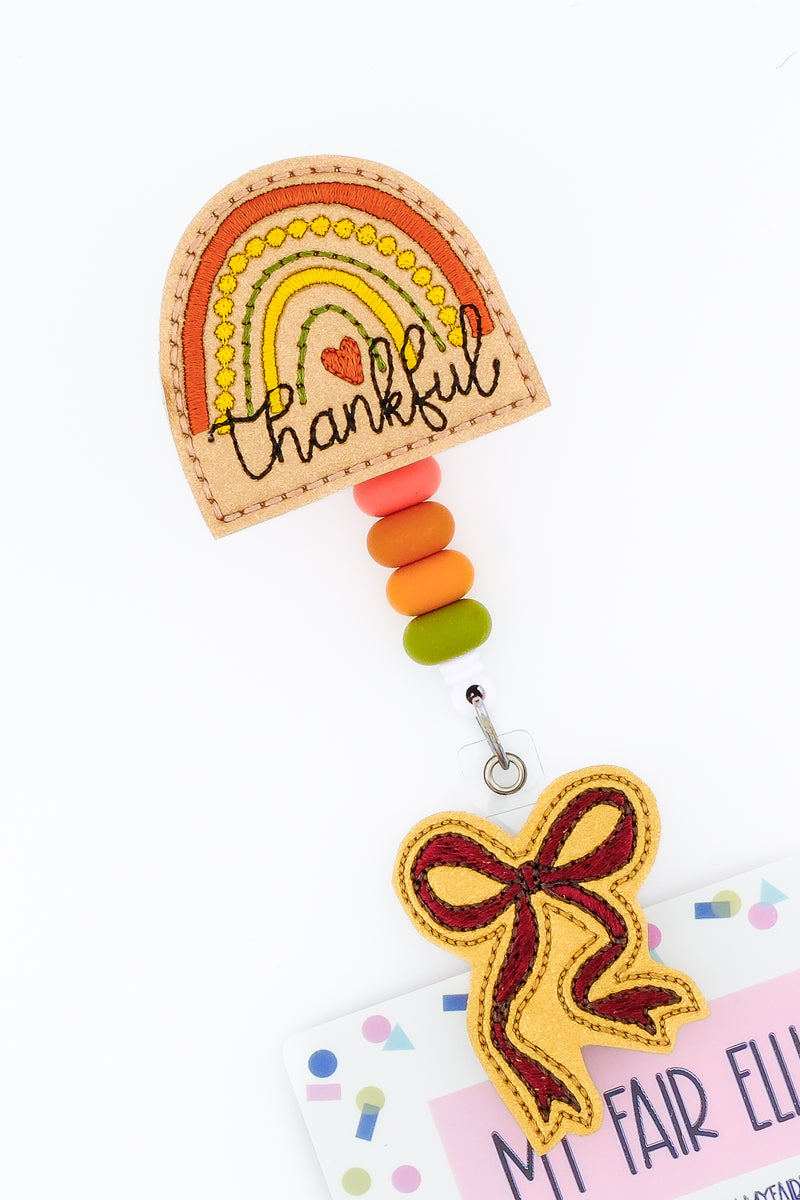 Thankful Rainbow + Bow Badge Reel Set // As Seen on Social Media
