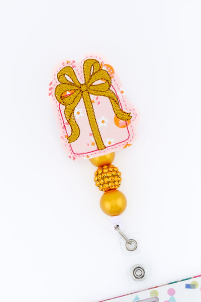Flower Printed Present with Gold Bow // Christmas